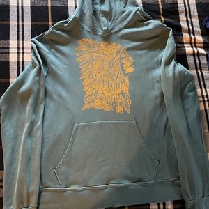 A Turquoise and yellow Native American hoodie